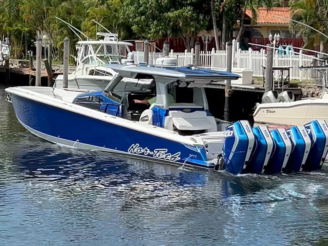 Center console boats docked at a South Florida marina served by Correct Reflect